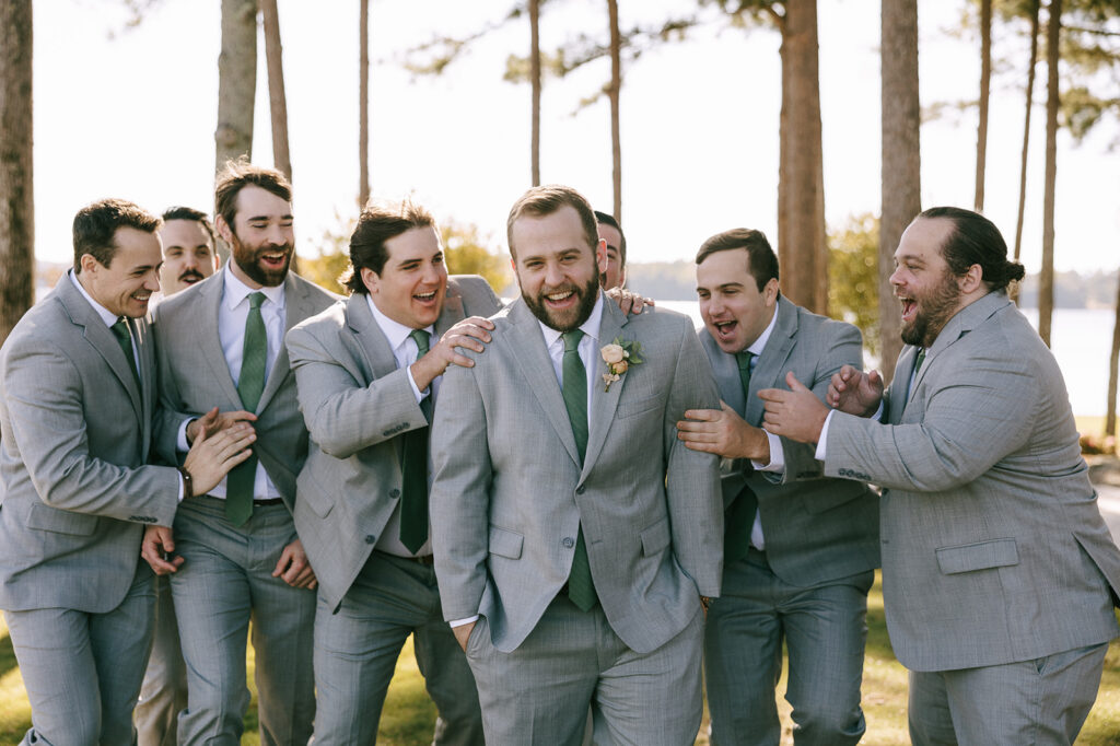 groom and his friends at his lake house wedding 