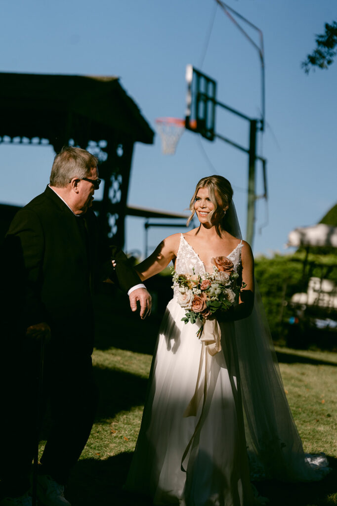 bride at her lake house wedding ceremony 