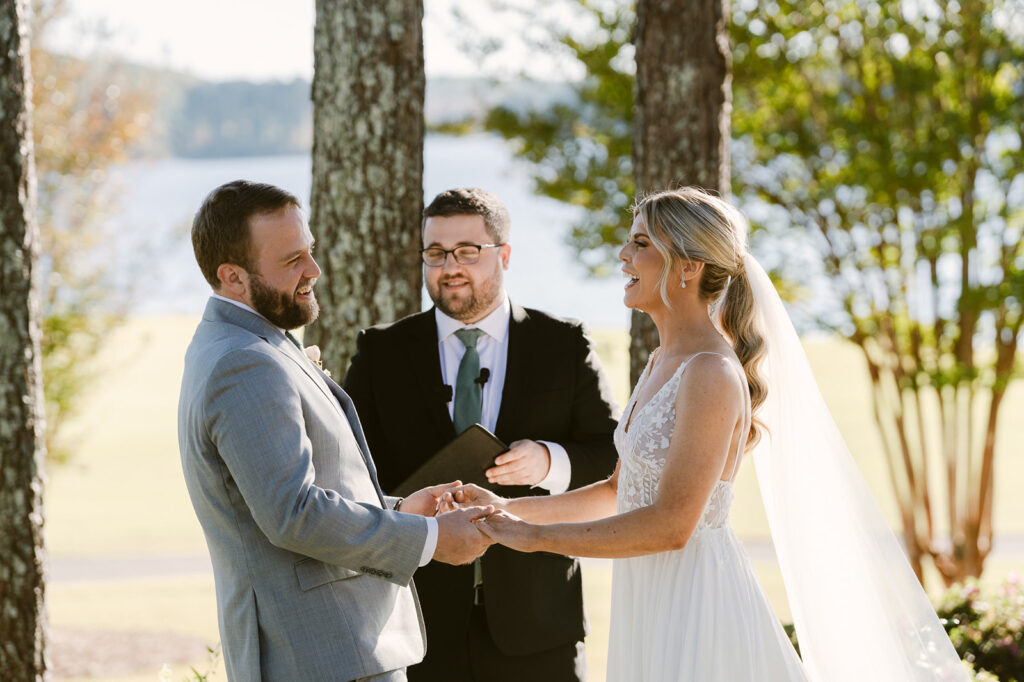 bride and groom holding hands at their wedding ceremony