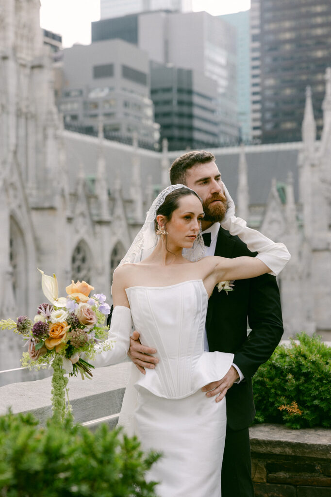 bride and groom hugging