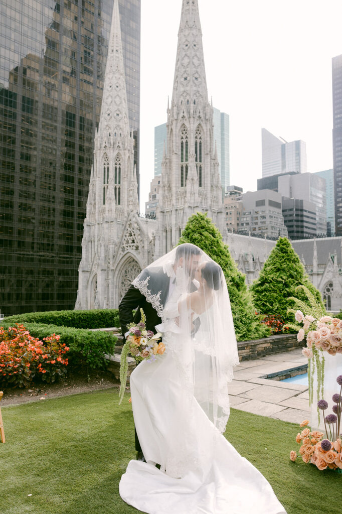 cute portrait of the bride and groom kissing 