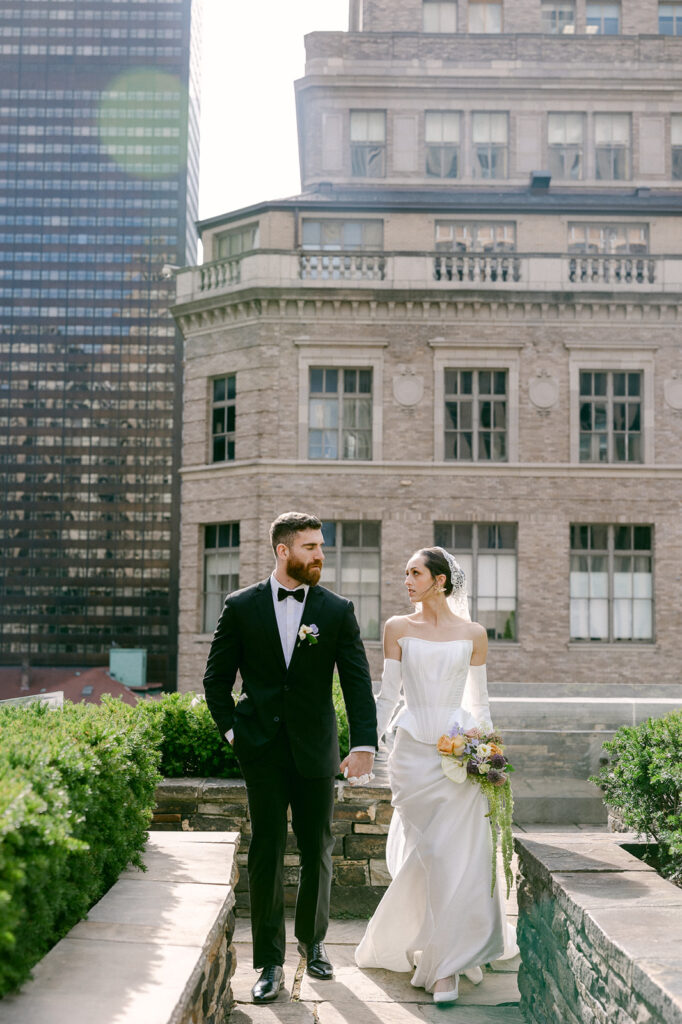 bride and groom looking at each other 