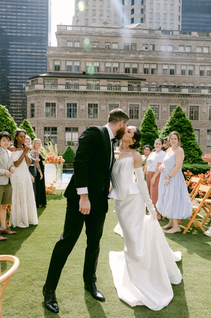 newlyweds kissing