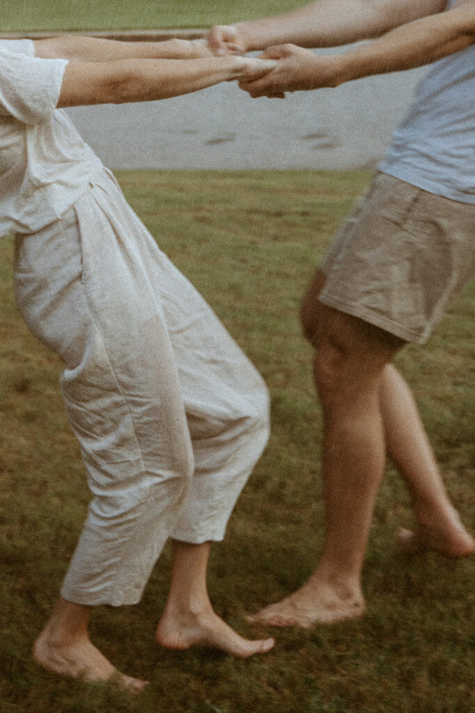 couple dancing in the rain 