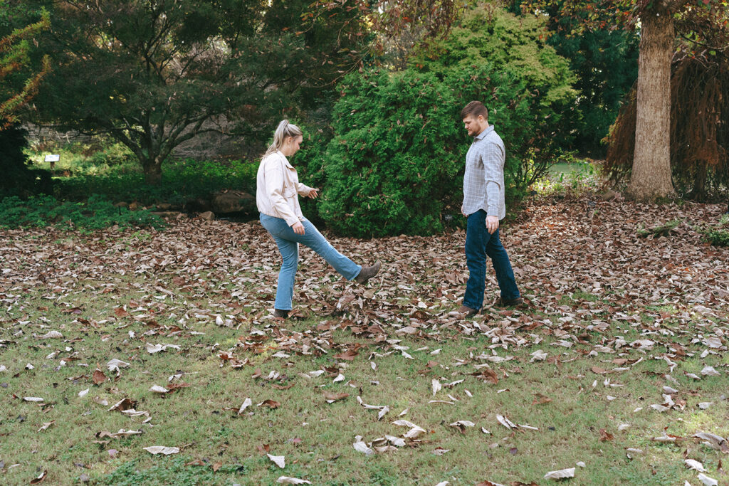 cute couple playing during their fun engagement session