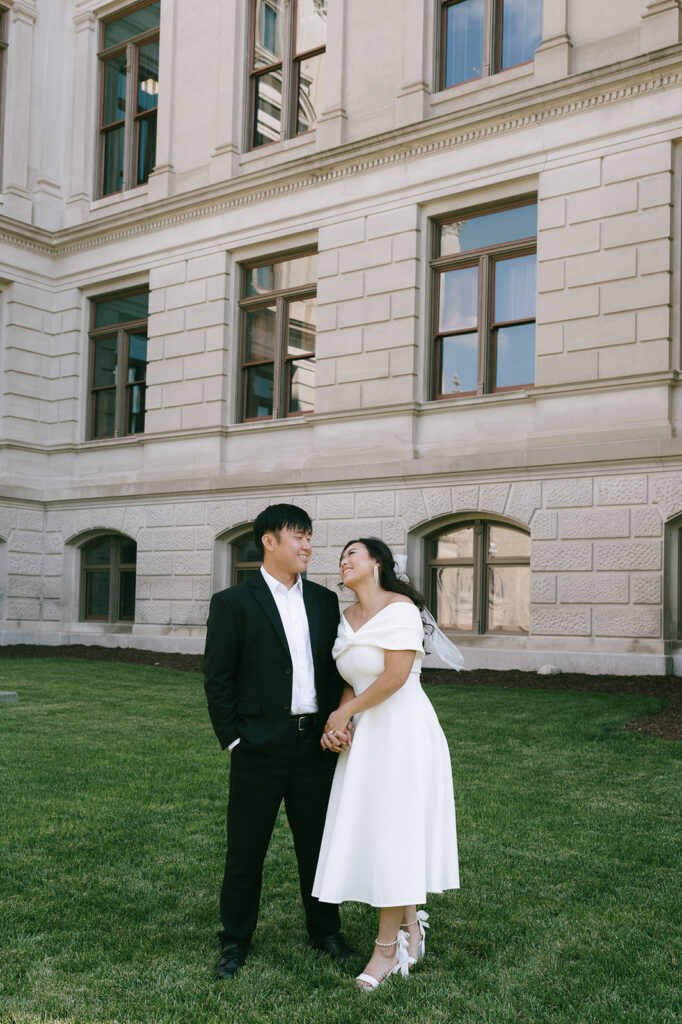 newly engaged couple looking at each other