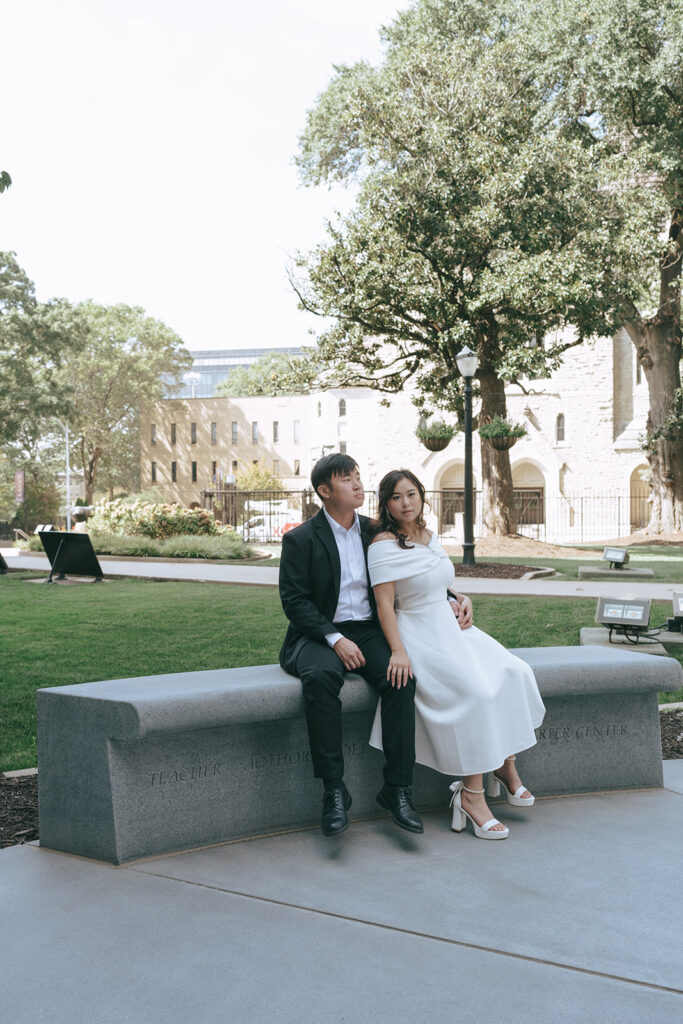 cute couple looking at the camera during their photoshoot 