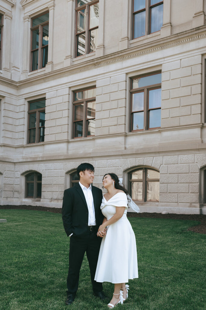 couple laughing with each other during their photoshoot