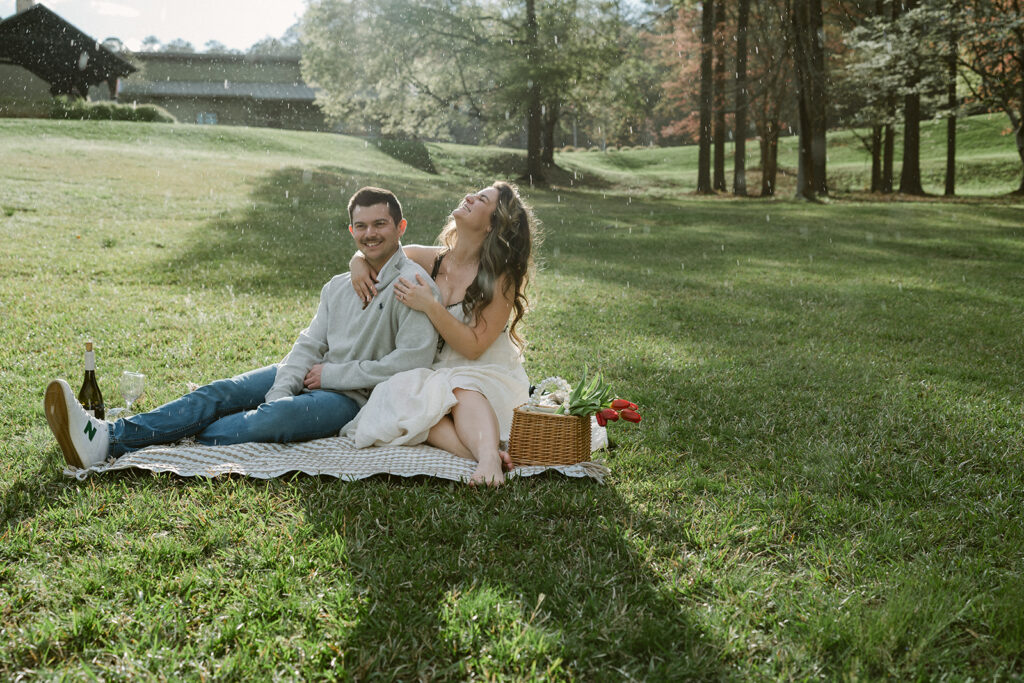 cute couple at their picnic proposal