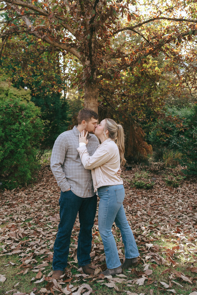 couple kissing during their engagement photohsoot