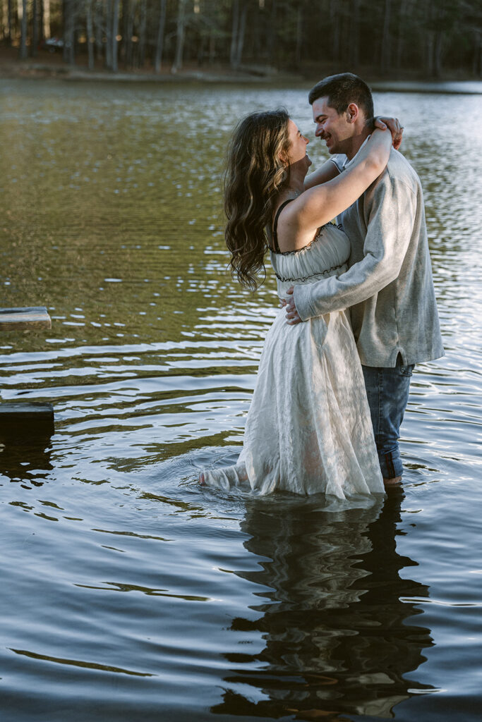 happy couple at their engagement session with their professional proposal photographer