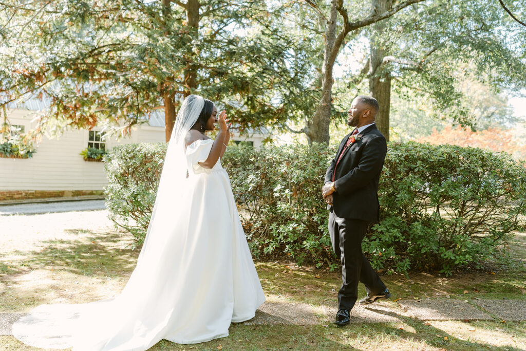 groom emotional seeing the bride on her wedding dress