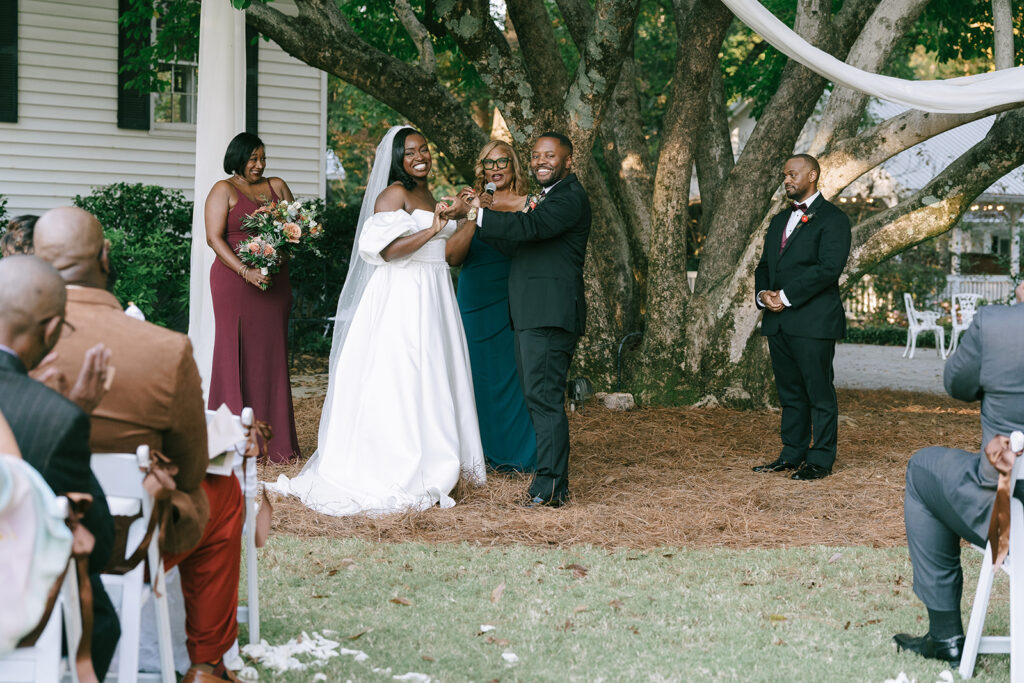 bride and groom happy at their dream ceremony 