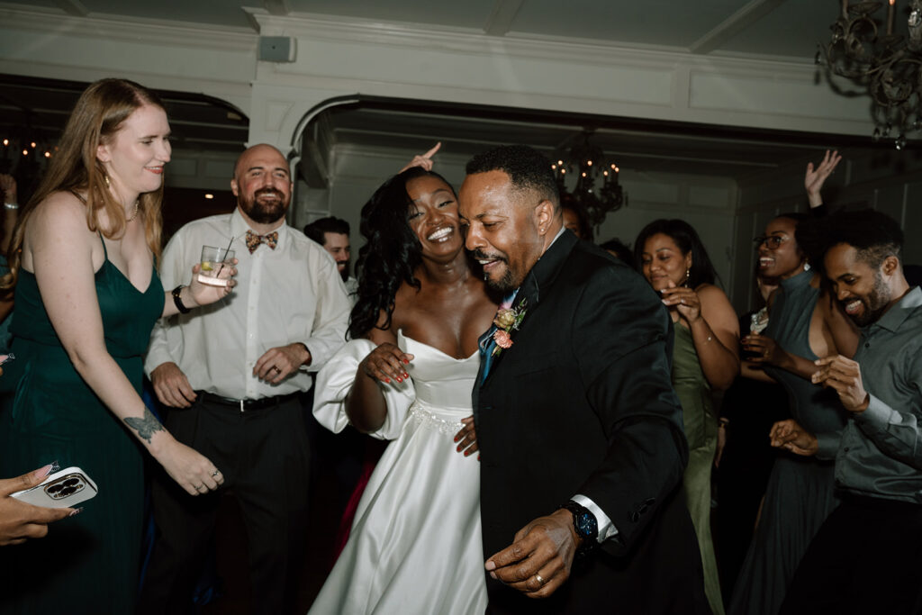 bride and groom dancing at their wedding reception