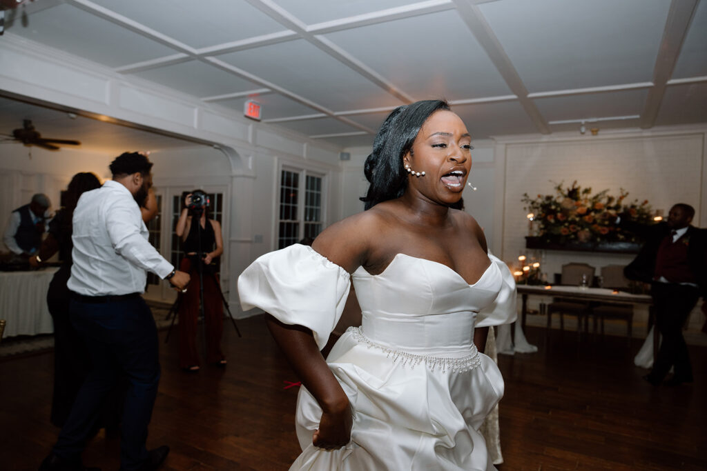 bride dancing at her wedding reception