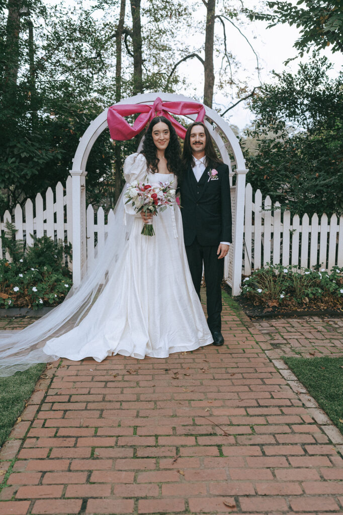 cute picture of the newlyweds before heading to the wedding reception