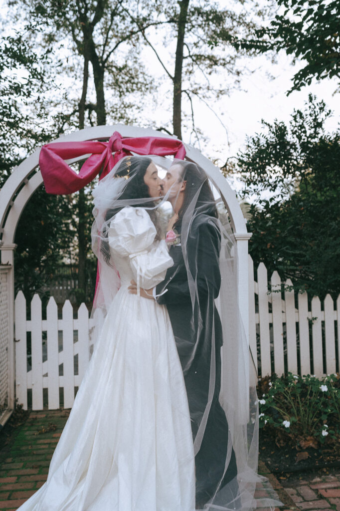 newlyweds at their coquette themed wedding