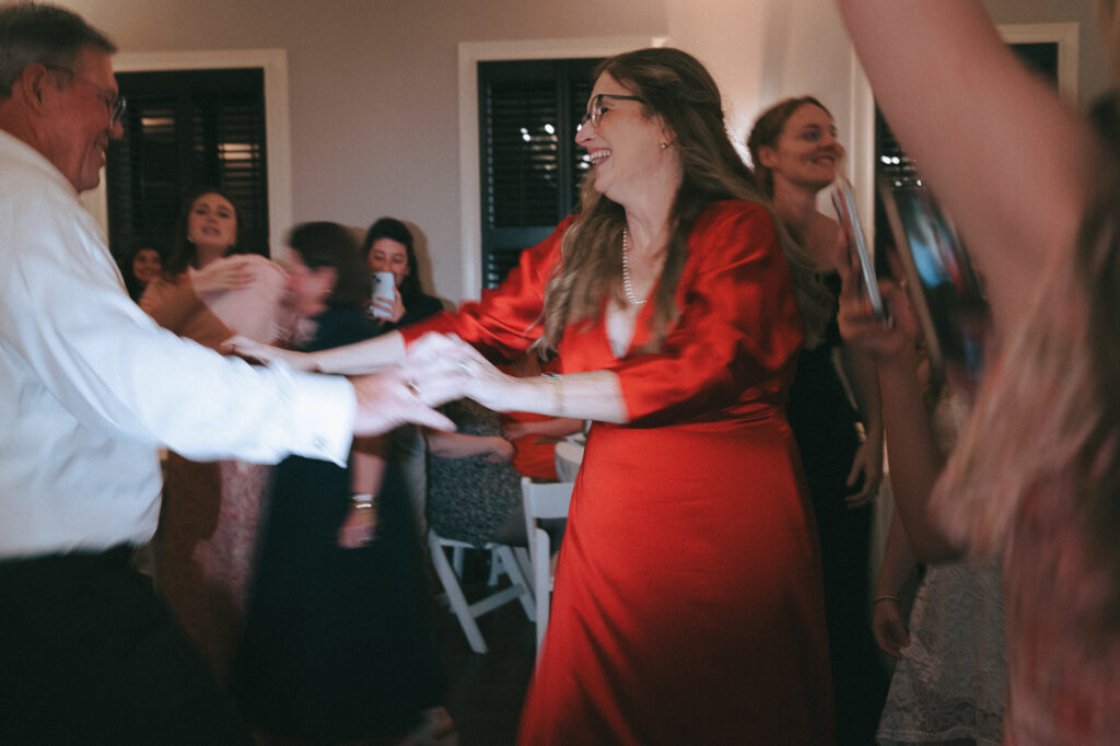 wedding guests dancing at the reception party