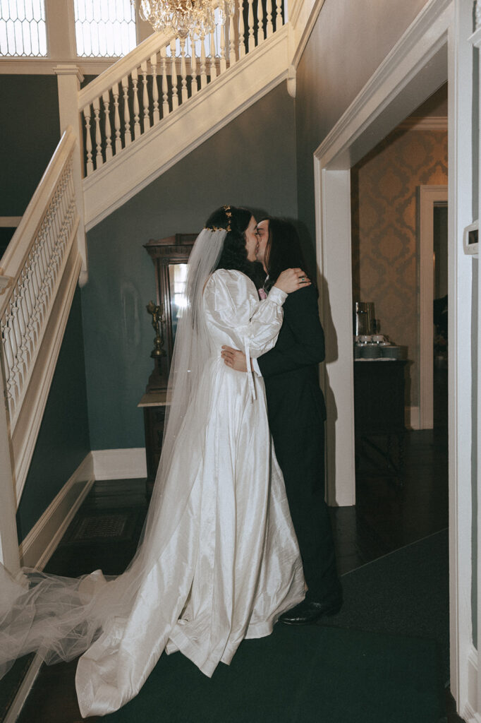 groom emotional seeing the bride in her wedding dress