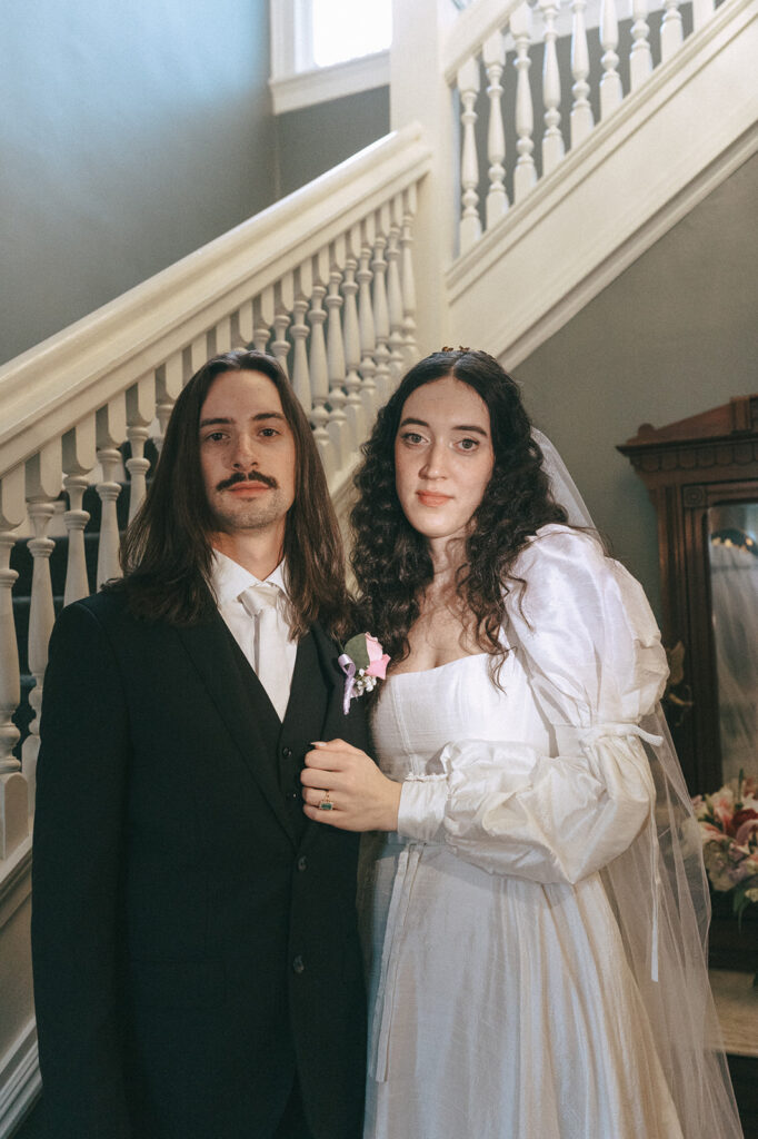 cute couple looking at the camera during their photoshoot