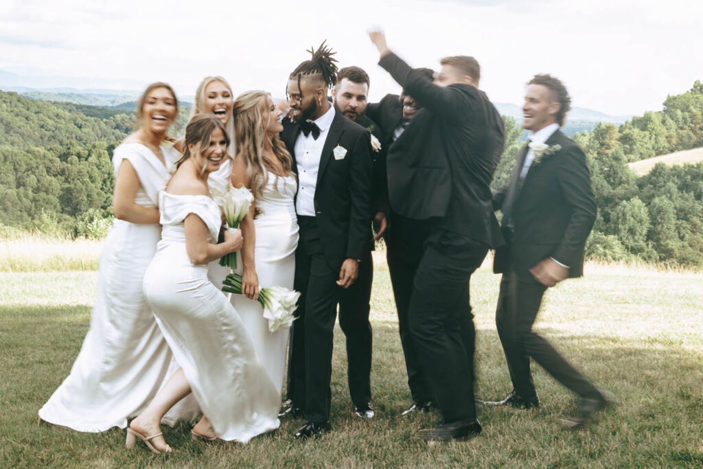 picture of the bride and groom with their friends before the wedding ceremony 