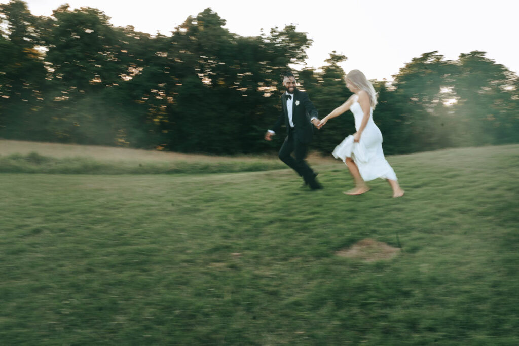 couple playing during their bridal portraits