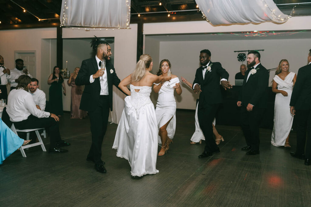 newlyweds dancing at their reception party