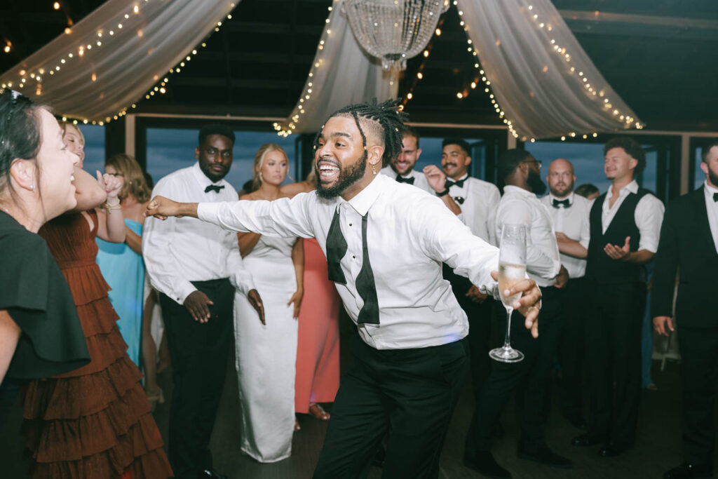 groom dancing at his reception party