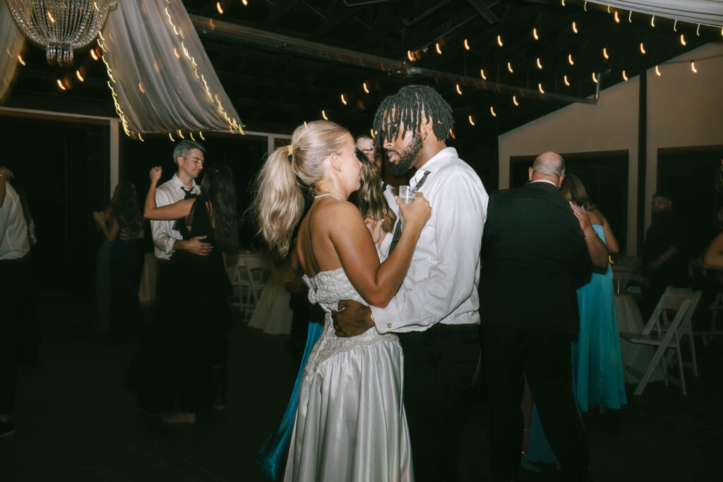 cute picture of the newlyweds dancing 