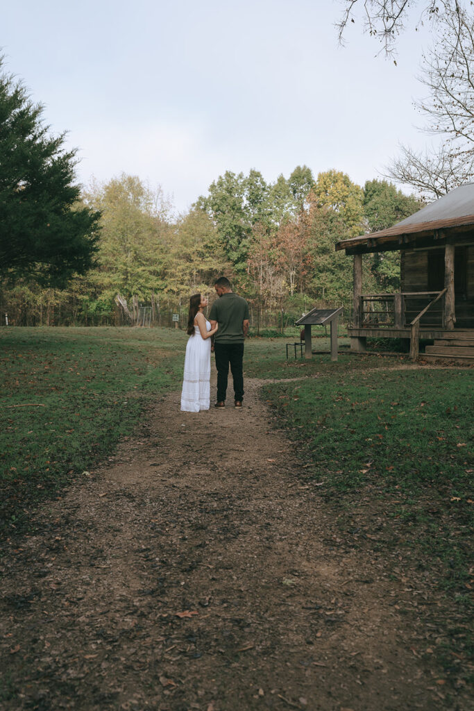 cute couple looking at each other during their winter engagement session