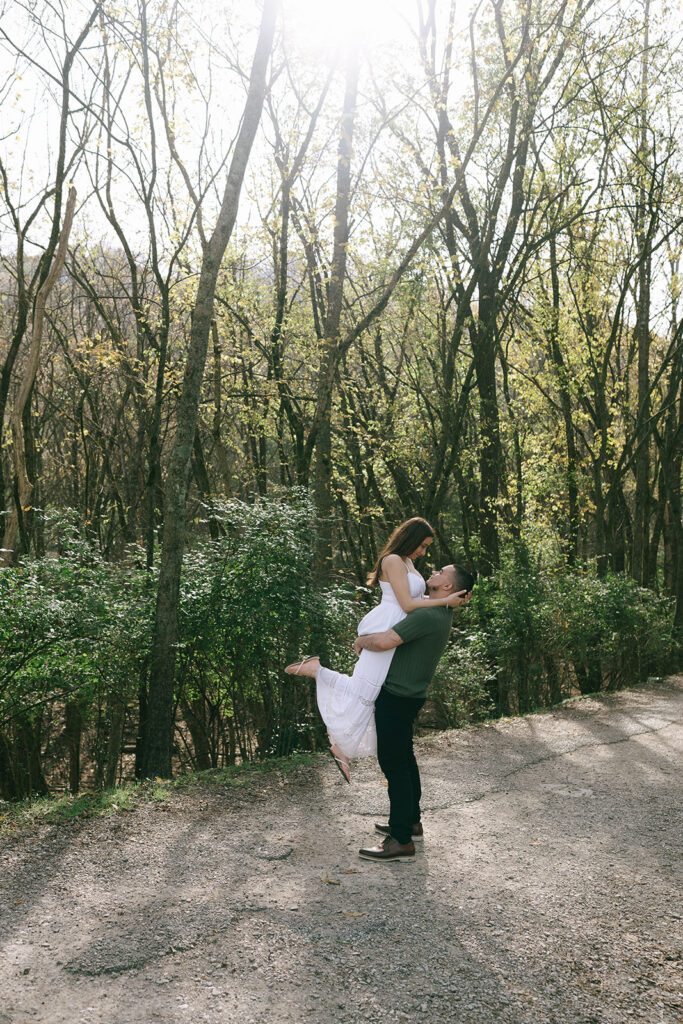 cute couple dancing at their winter engagement session