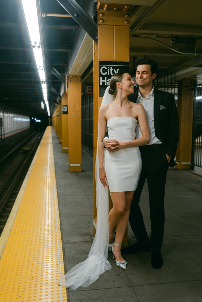 picture of the bride and groom hugging 