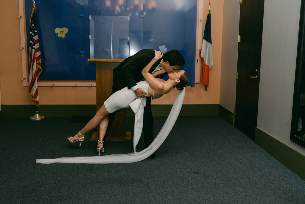 couple kissing after their dream NYC ceremony location