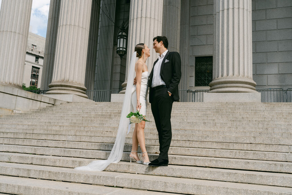 cute couple looking at each other during their elopement photoshoot 