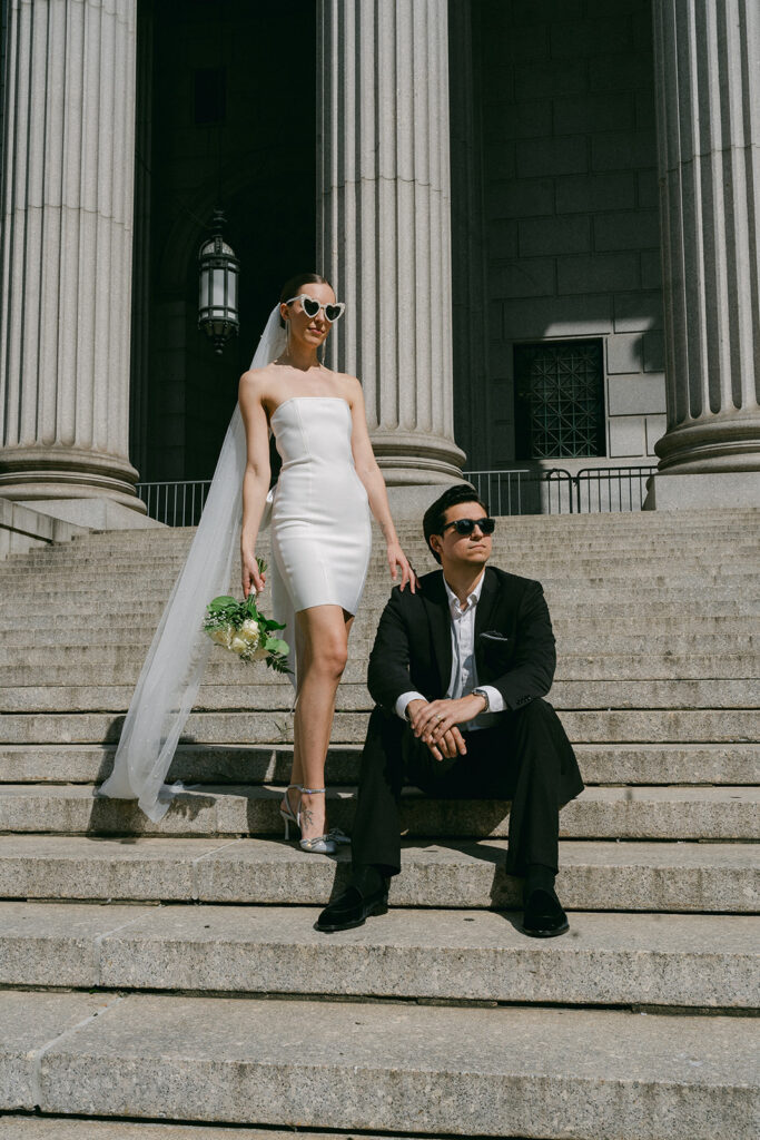 cute couple posing during their bridal portraits