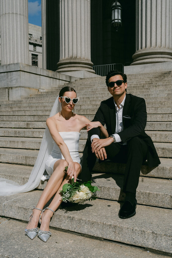 couple looking at the camera during their elopement session - elope in NYC 