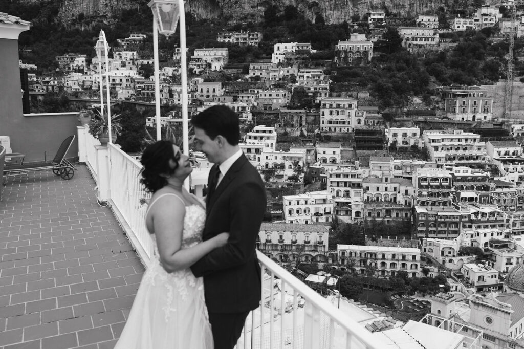 cute couple looking at each other during their bridal portraits 