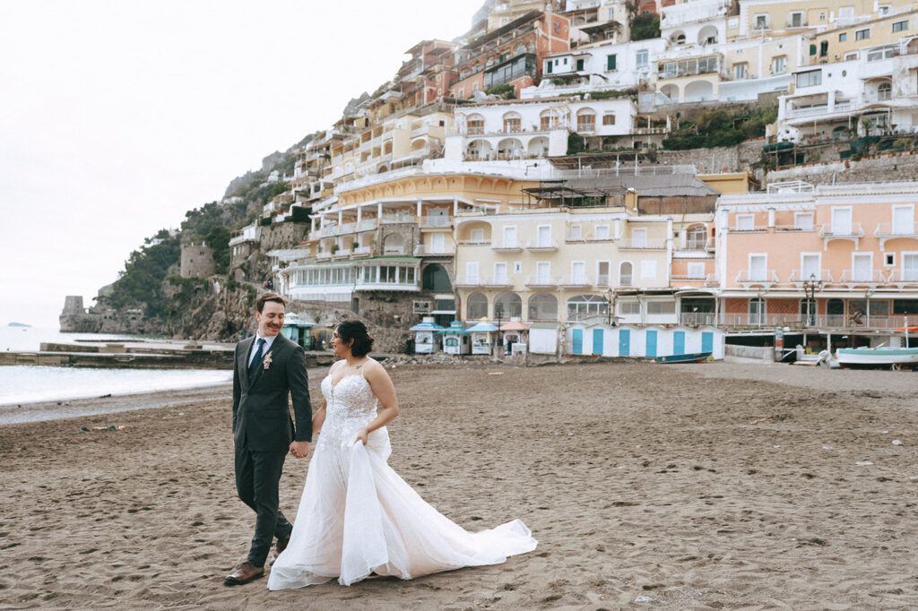 couple running around the amalfi coast during their elopement photoshoot