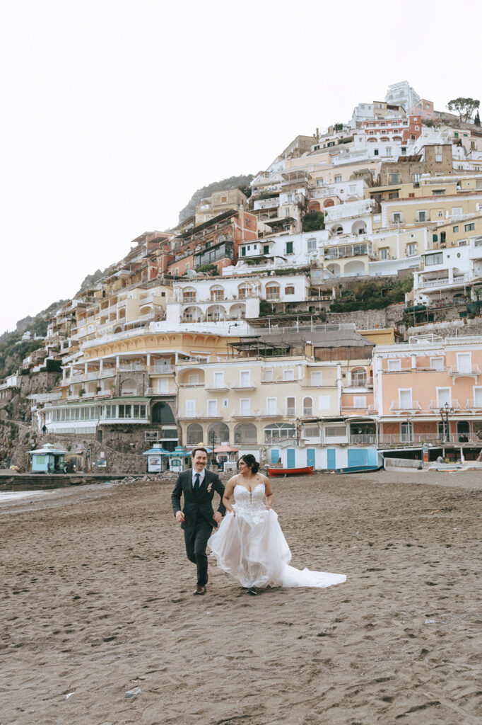 cute couple playing during their bridal portraits 