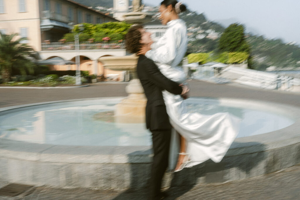 bride and groom dancing during their lake como photoshoot