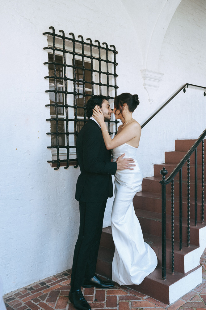 cute picture of the bride and groom smiling at each other