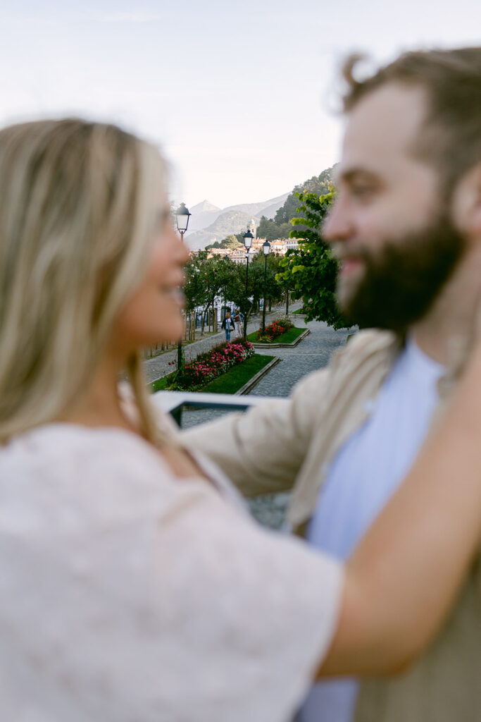 cute couple looking at each other during their photoshoot