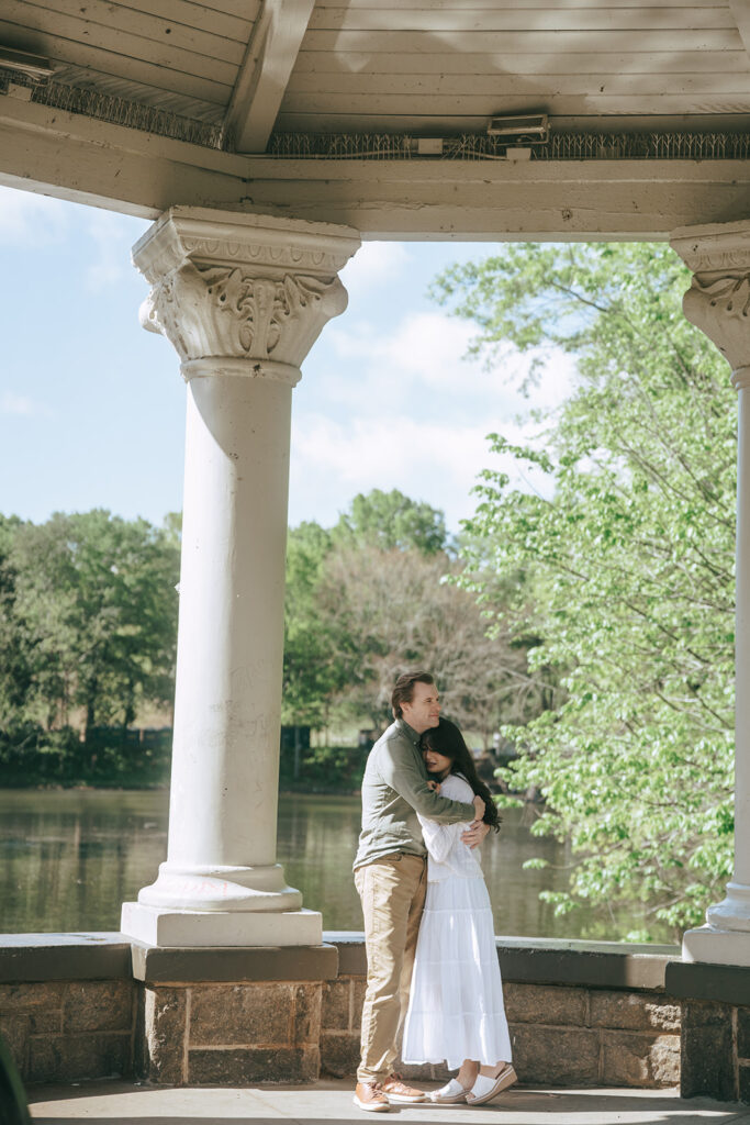 cute picture of the newly engaged couple hugging