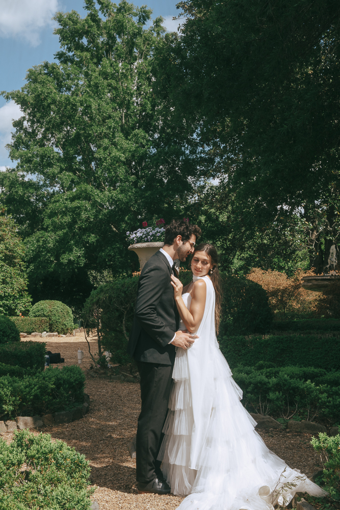 groom kissing the bride on the forehead