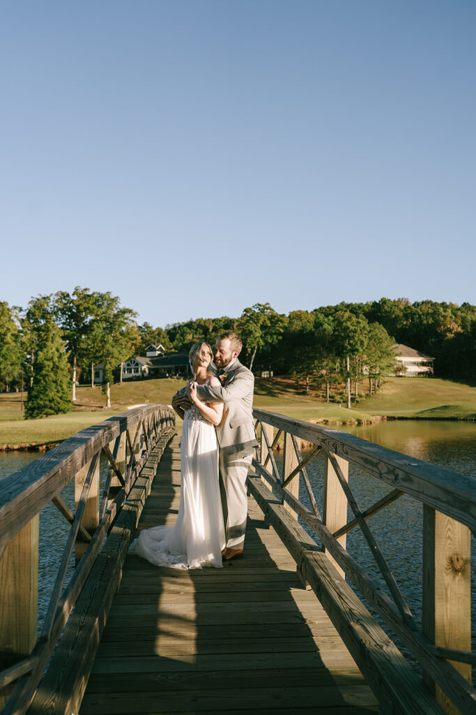 cute picture of the bride and groom hugging