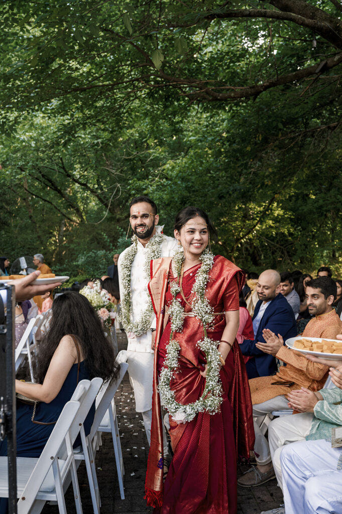 cute picture of the newly married couple heading to their reception