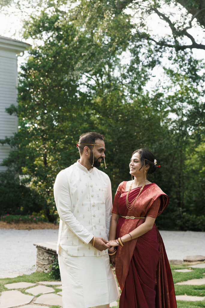 cute couple holding hands during their bridal session