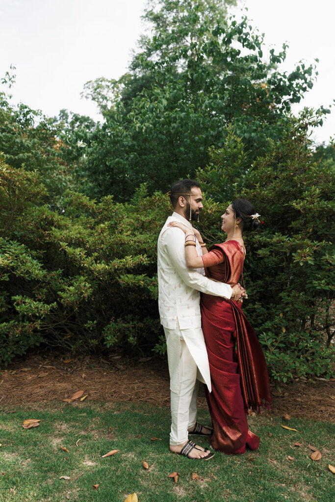 cute picture of the newlyweds laughing with each other during their photoshoot