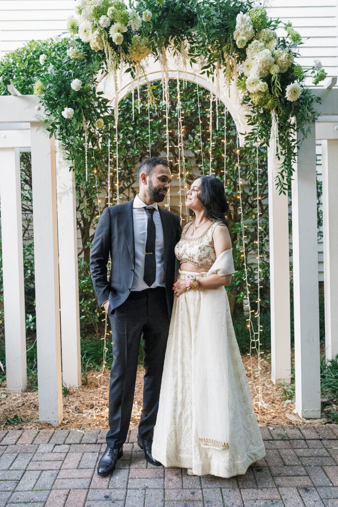 cute picture of the bride and groom smiling at each other