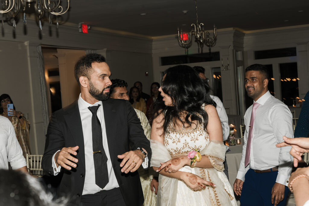 newlyweds dancing at their reception party